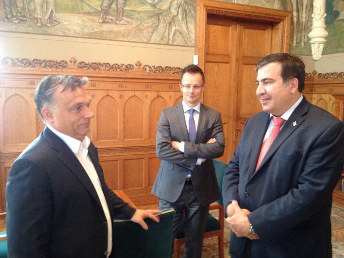 Photo: Mr. Orban (left) with Mr. Saakashvili (right)  and "boychik" Péter Szíjjártó  Hungarian foreign minister-designate in the middle.