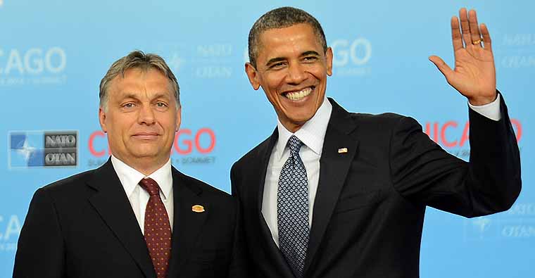 AFP file photo. US President Barack Obama (R) greets Prime Minister of Hungary Viktor Orb·n at McCormick Place in Chicago, Illinois, during the NATO 2012 Summit May 20, 2012 . AFP PHOTO Jim WATSON.