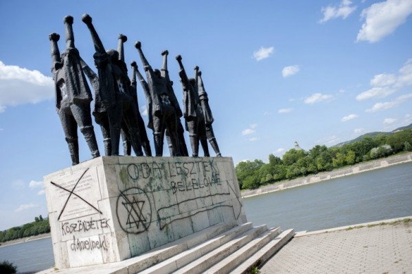 An example of a defaced Holocaust monument in Hungary, with graffiti from 2013. Photo: atv.hu