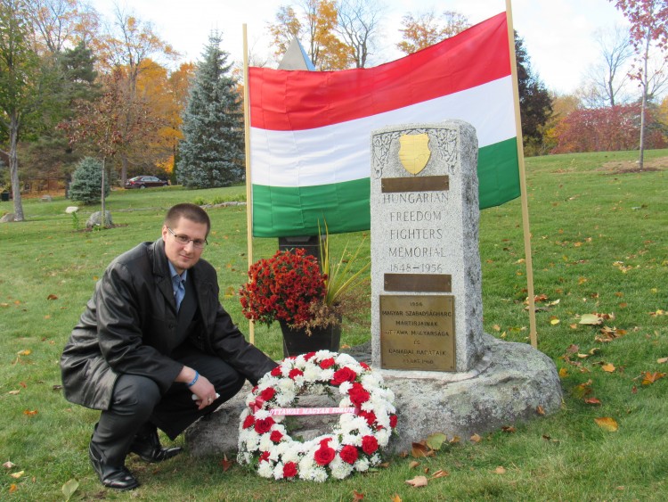 Bálint Mészáros lays the Ottawa Hungarian Forum's wreath at the foot of the 1956 Hungarian Freedom Fighters' monument in Beechwood Cemetery. Photo: C. Adam.