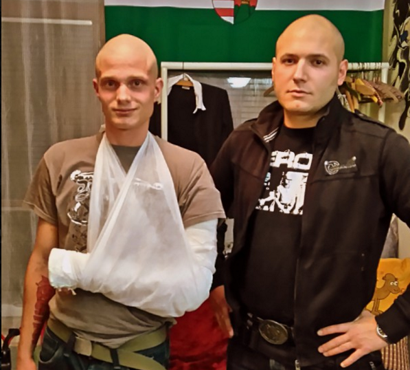 The victim of the attack in Kőbánya (left) standing with another skinhead, who happens to be Béla Incze, vice president of the Sixty-Four Counties Youth Movement. 