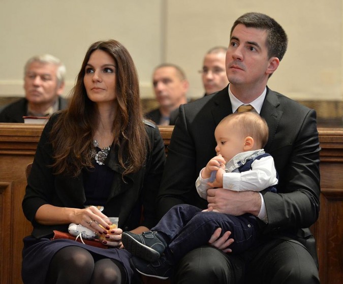 Máté Kocsis, with his wife, at his son's christening...one of many family pictures that Mayor Kocsis shares on Facebook.