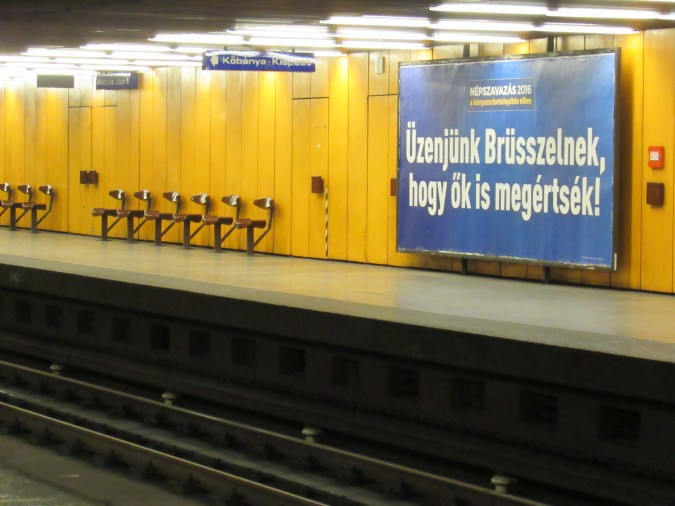 Government campaign billboard in a Budapest metro station: Let's send a message to Brussels, so that even they will undertand!" Photo: Christopher Adam.