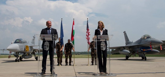 Mr. István Simicskó, Hungarian Defense Minister greets US NATO soldiers at Pápa Air Base with US Ambassador Ms. Colleen Bell.