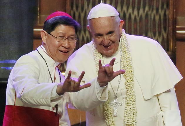  Cardinal Tagle and Pope Francis. Tagle’s grandparents were refugees from China.