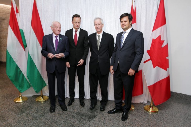 Canada's Minister of Foreign Affairs, Stéphane Dion (third from the left) meets with Péter Szijjártó. Bálint Ódor is on the far-right. 