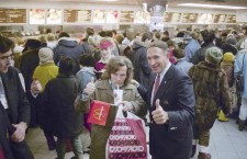 A flashback to 1990: A Russian customer at the first McDonald's in Moscow gives a thumbs up, standing alongside George Cohon, the chairman of McDonald's Canada. Photo: Rudi Blaha/Associated Press.