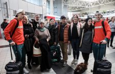 The Liu brothers with their family at Budapest Airport.